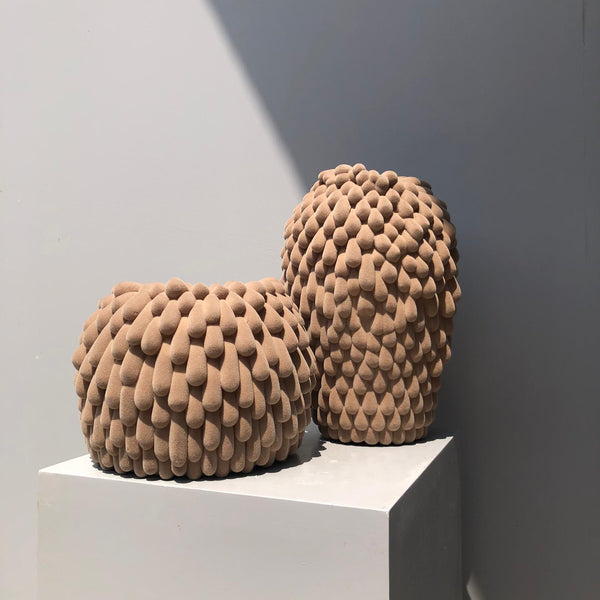 Tears in Brown Vases